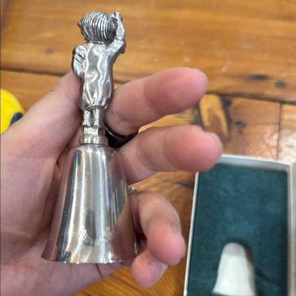 Reed & Barton Silver Bell with Toddler holding a sock - Picture 4 of 7